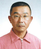 造林地での施業を担当されている村上商事 村上光生さんの写真